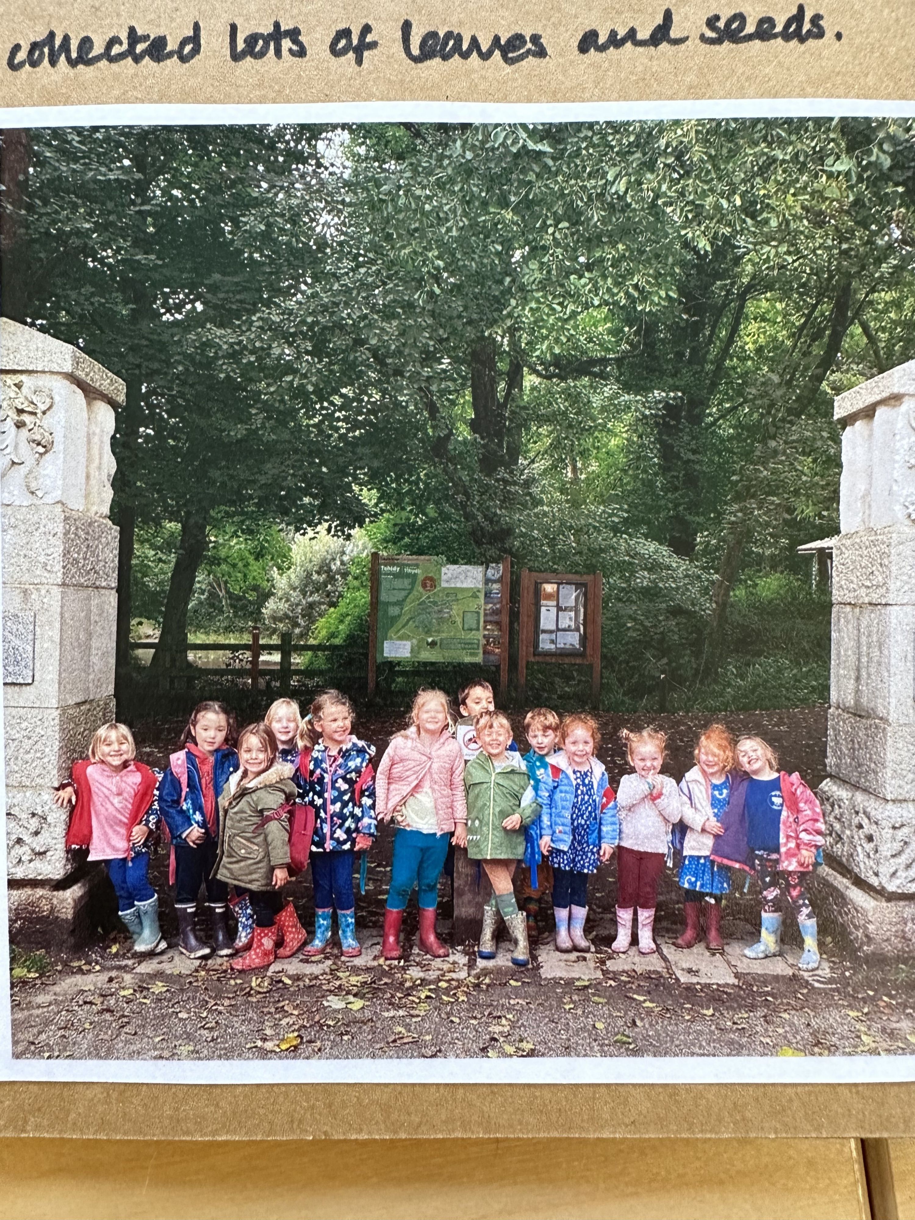 children standing outside a church field
